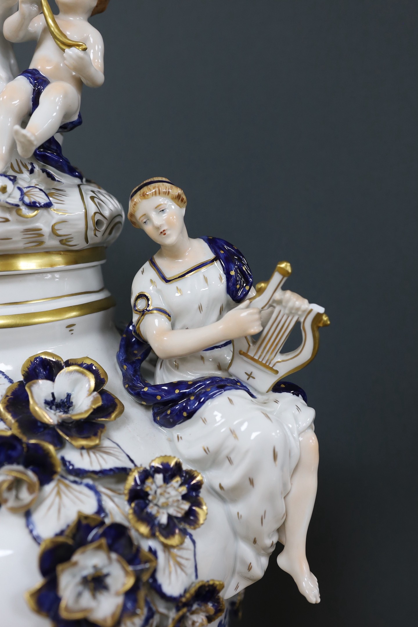 A large and impressive gilt blue and white Dresden lidded urn on stand - 77cm high